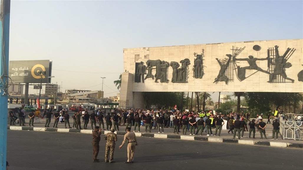 القوات الامنية تباشر بقطع جميع الطرق المؤدية الى ساحة التحرير
