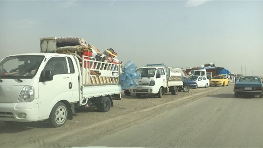 عائدون الى الحويجة يشكون بقائهم عالقين عند معبر خالد