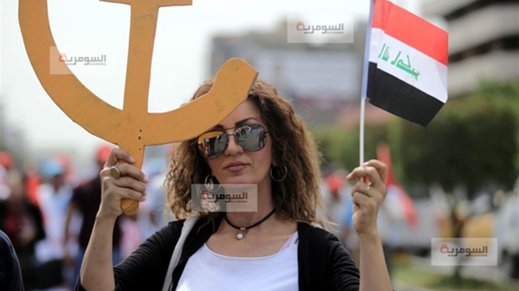 بالصور.. عمال العراق يحتفلون بعيدهم العالمي في بغداد رافعين الاحمر وصور ماركس